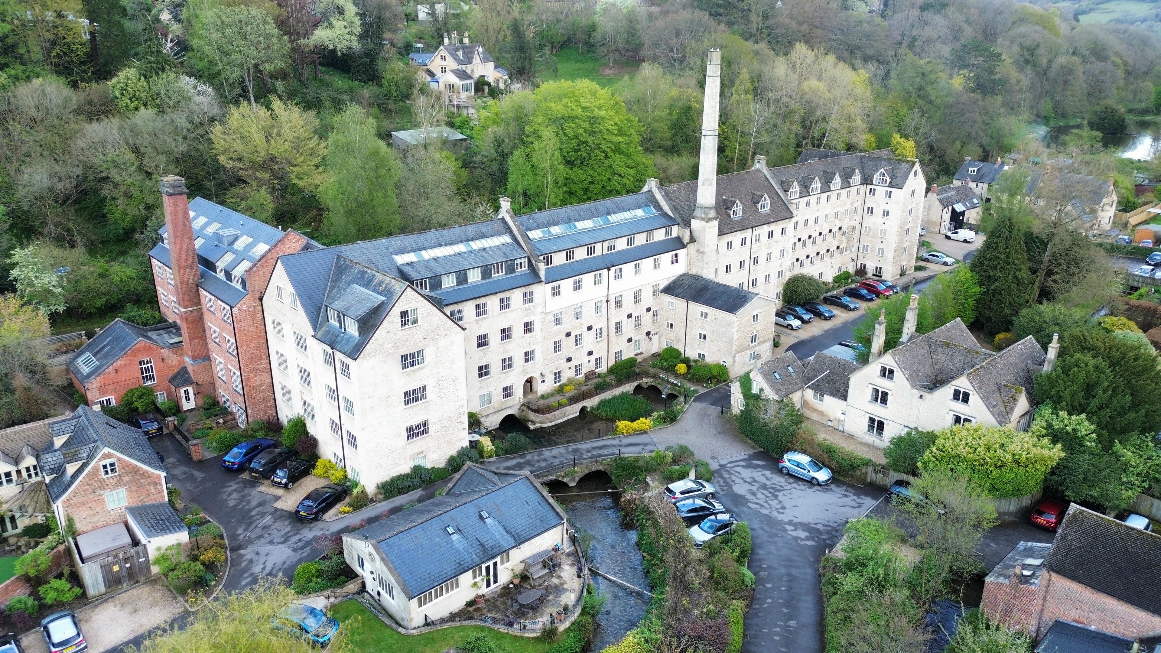 Aerial drone view of a residential roof inspection by TDV Surveying