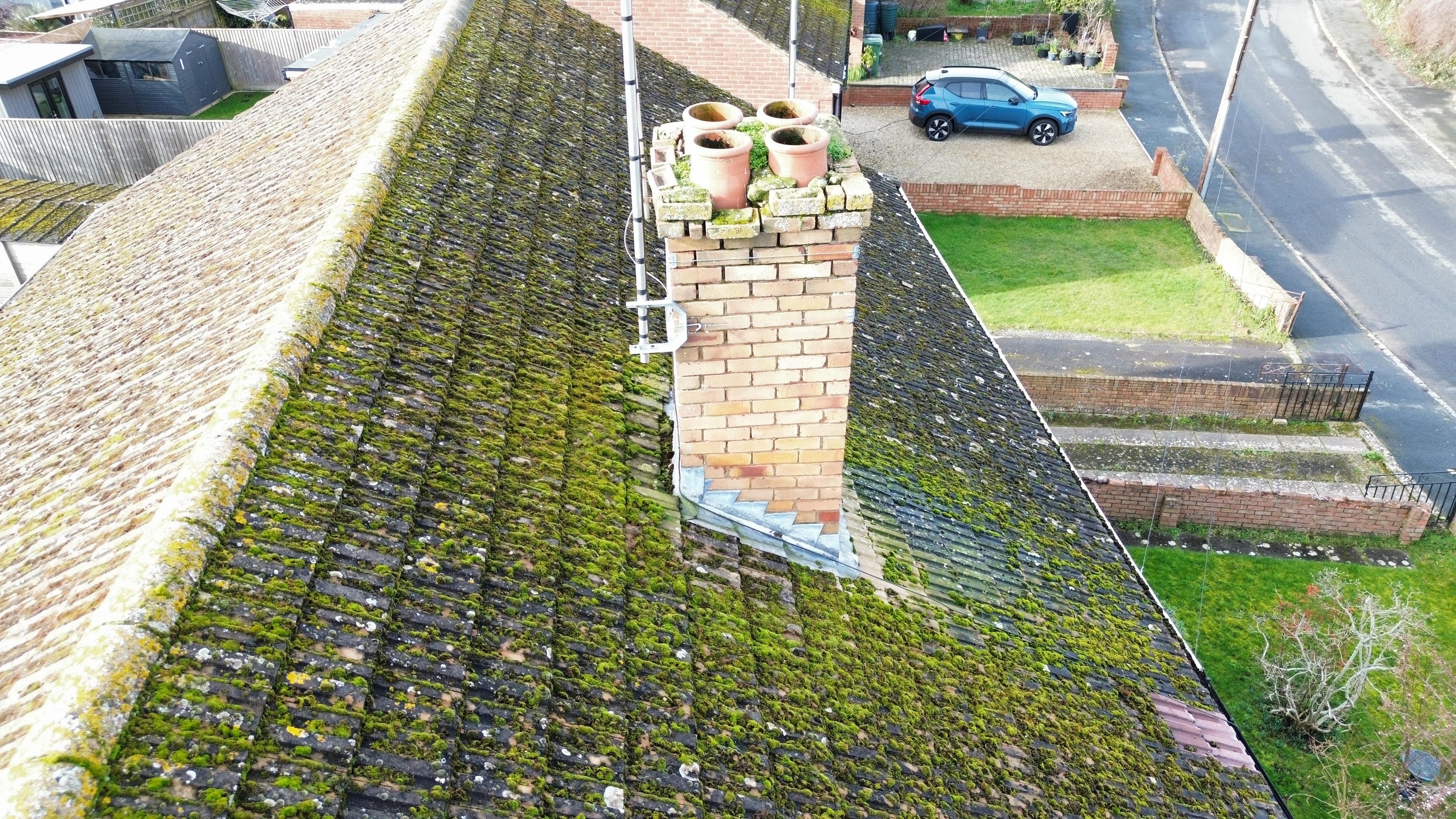 Close-up aerial drone inspection of a chimney stack showing detailed condition